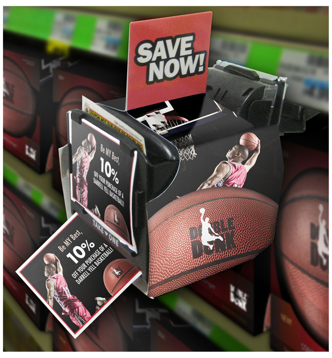 Image of a coupon dispenser attached to the side of a shelf containing Double Dunk basketballs. The dispenser has a picture of basketball player Darrell Yell on it and the words, 'Be your best.' Sticking out of the dispenser is a coupon advertising 10% off the price of a Double Dunk basketball.
