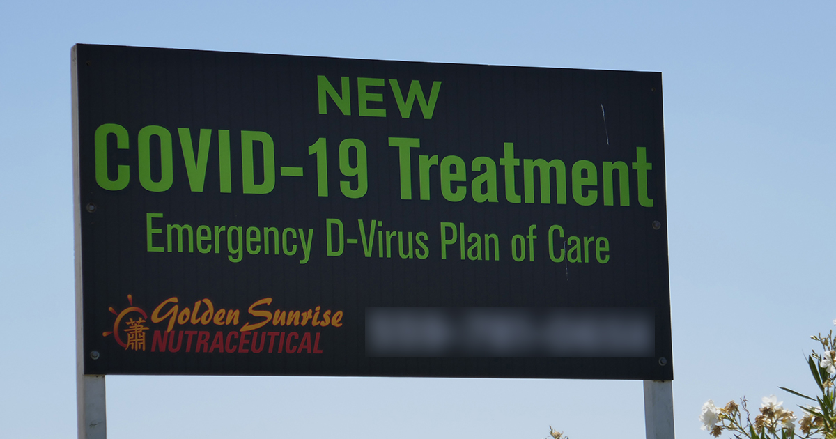 Billaboard display stating " NEW COVID-19 Treatment Emergency D-Virus Plan of Care, Golden Sunrise Nutraceutical"